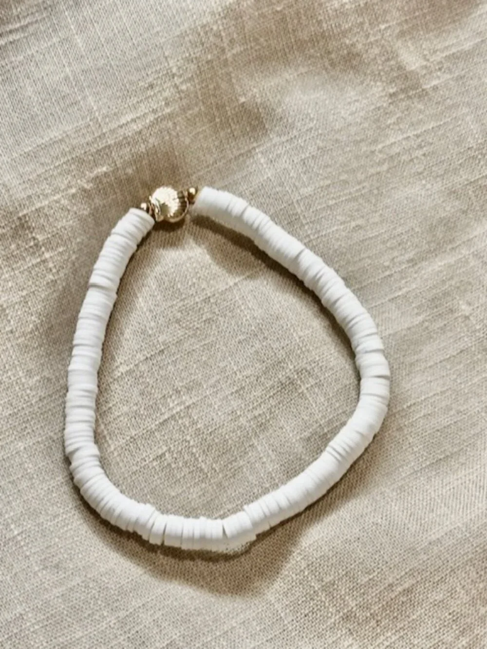 Heishi Bead Stretch Bracelet with Seashell Charm Gold Plated Accents White